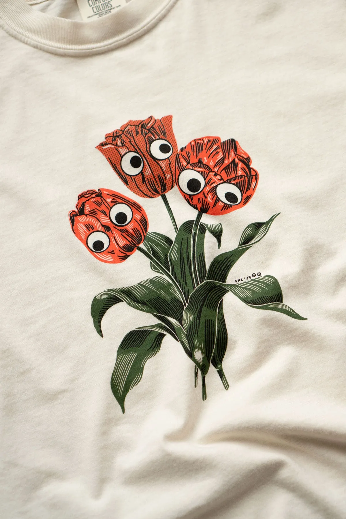 Whimsical Googly Tulip Trio Graphic Tee - Fun Floral Design T-Shirt for Casual Wear