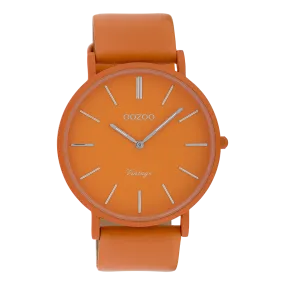 Orange  watch with orange leather strap